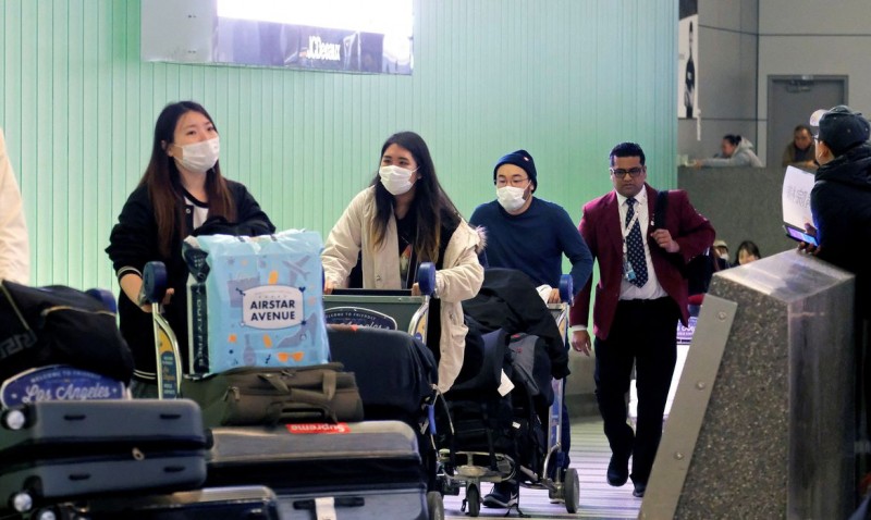 Casos importados na China superam infecções locais pelo 5° dia